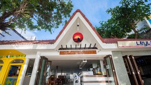 The entrance of Deparis Bedi Resort with a clear view of the reception area and a signboard. - Deparis Beach Resort (Boracay Island)