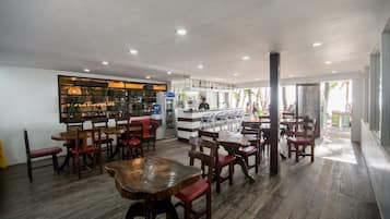 Breakfast, lunch, dinner served; beach views