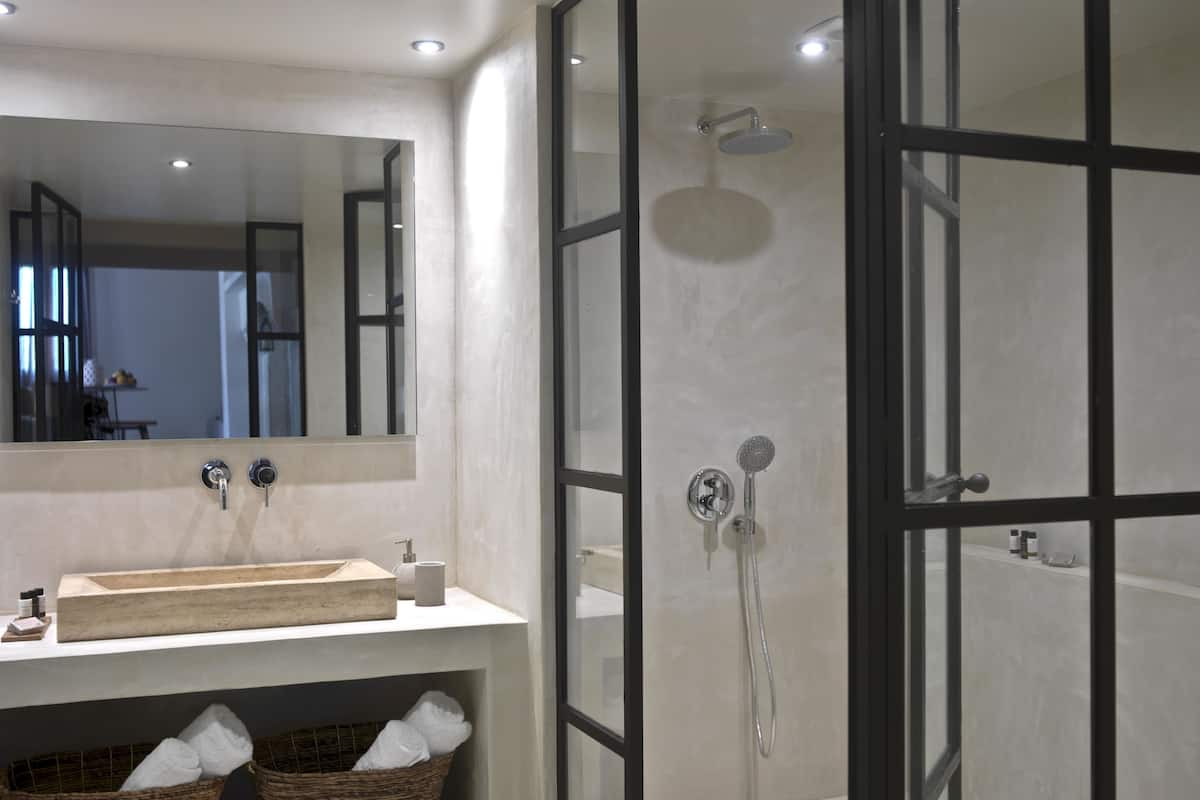 superior suite (kotsifali, 2-storey) | bathroom | shower, free toiletries, hair dryer, bathrobes
