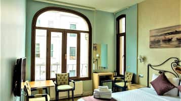 2 habitaciones, ropa de cama de alta calidad y minibar