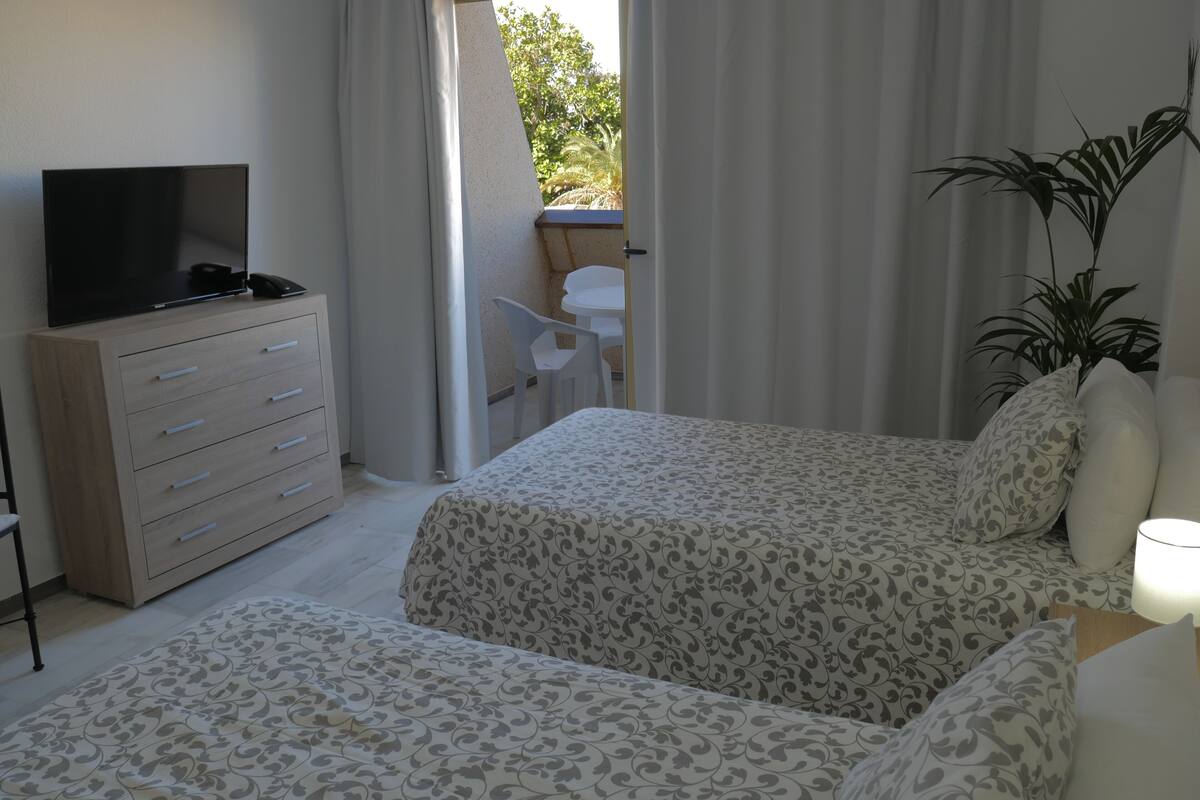 Down comforters, desk, iron/ironing board (on request), cribs (free)