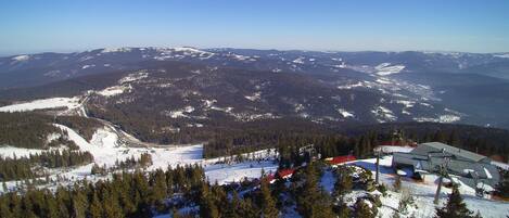 A mountainous landscape with a ski resort.