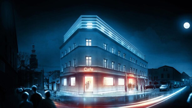 A multi-story building with a cafe and a hotel sign, featuring a modern architectural design with a prominent corner. - Hotel Opera (Tarnowskie Gory)