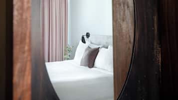 Hypo-allergenic bedding available, in-room safe, desk, laptop workspace