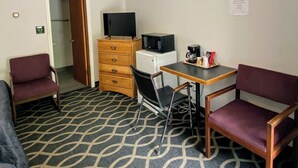 Tabla de planchar con plancha, wifi gratis, ropa de cama