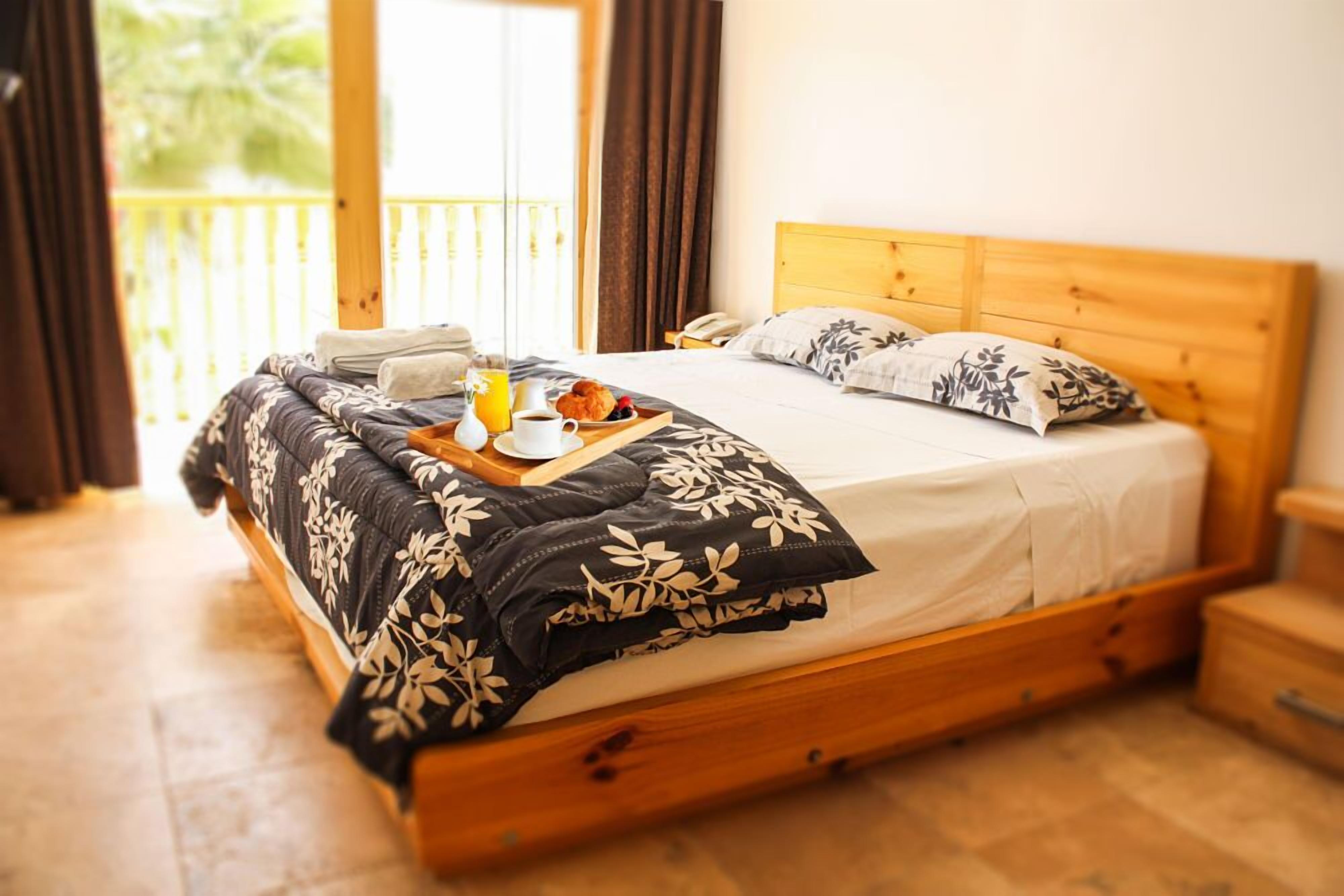 superior double room, pool view | premium bedding, minibar, in-room safe, desk