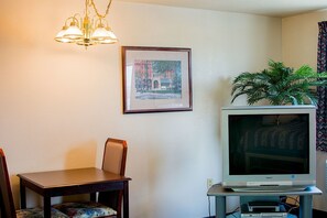 Suite, 1 King Bed, Jetted Tub | Living area | LED TV - Village Inn & Suites (Marysville)