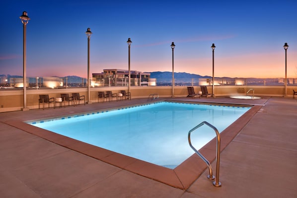 Outdoor pool, open 6:00 AM to 10:00 PM, sun loungers