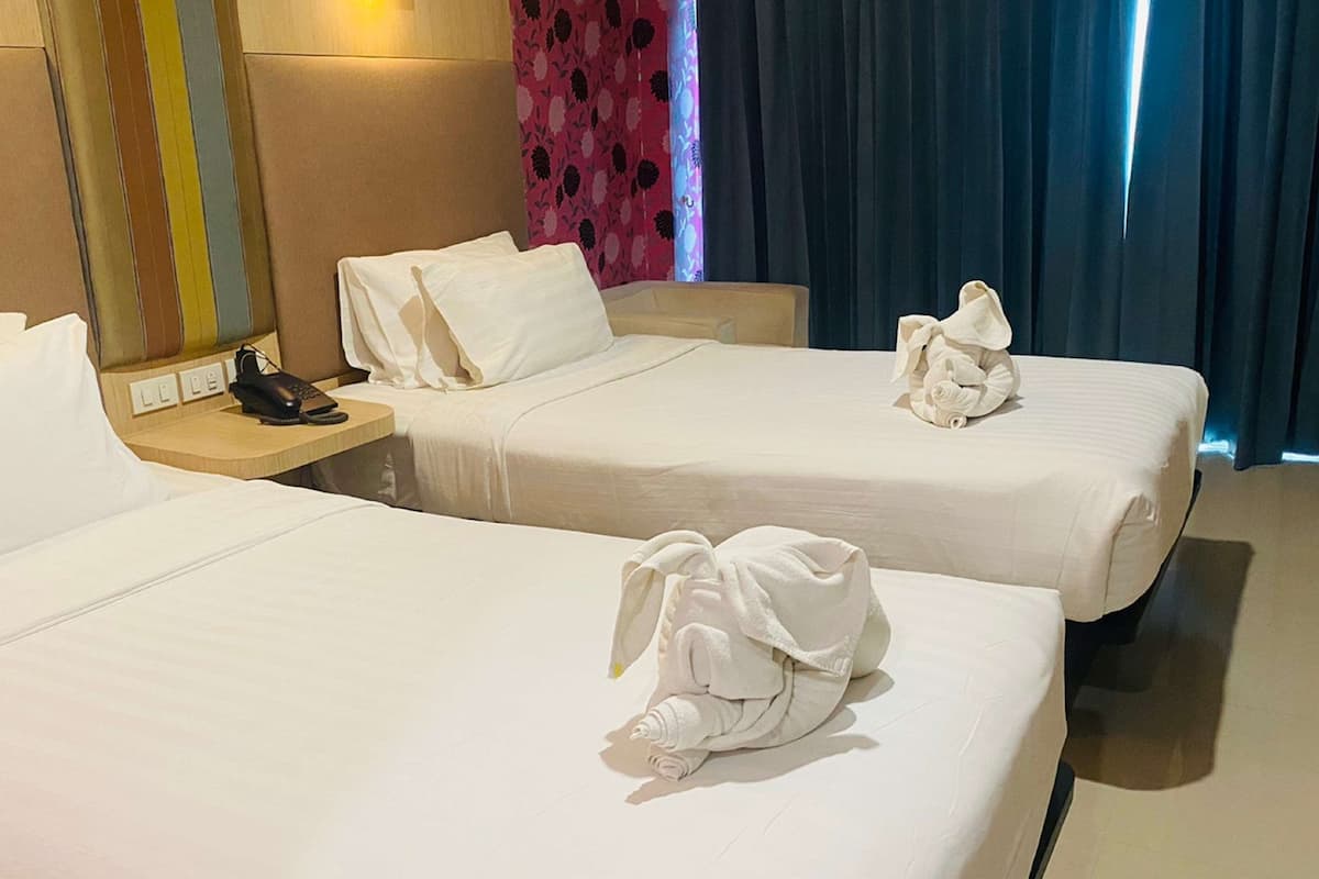 room, 2 single beds | 1 bedroom, in-room safe, desk, blackout curtains