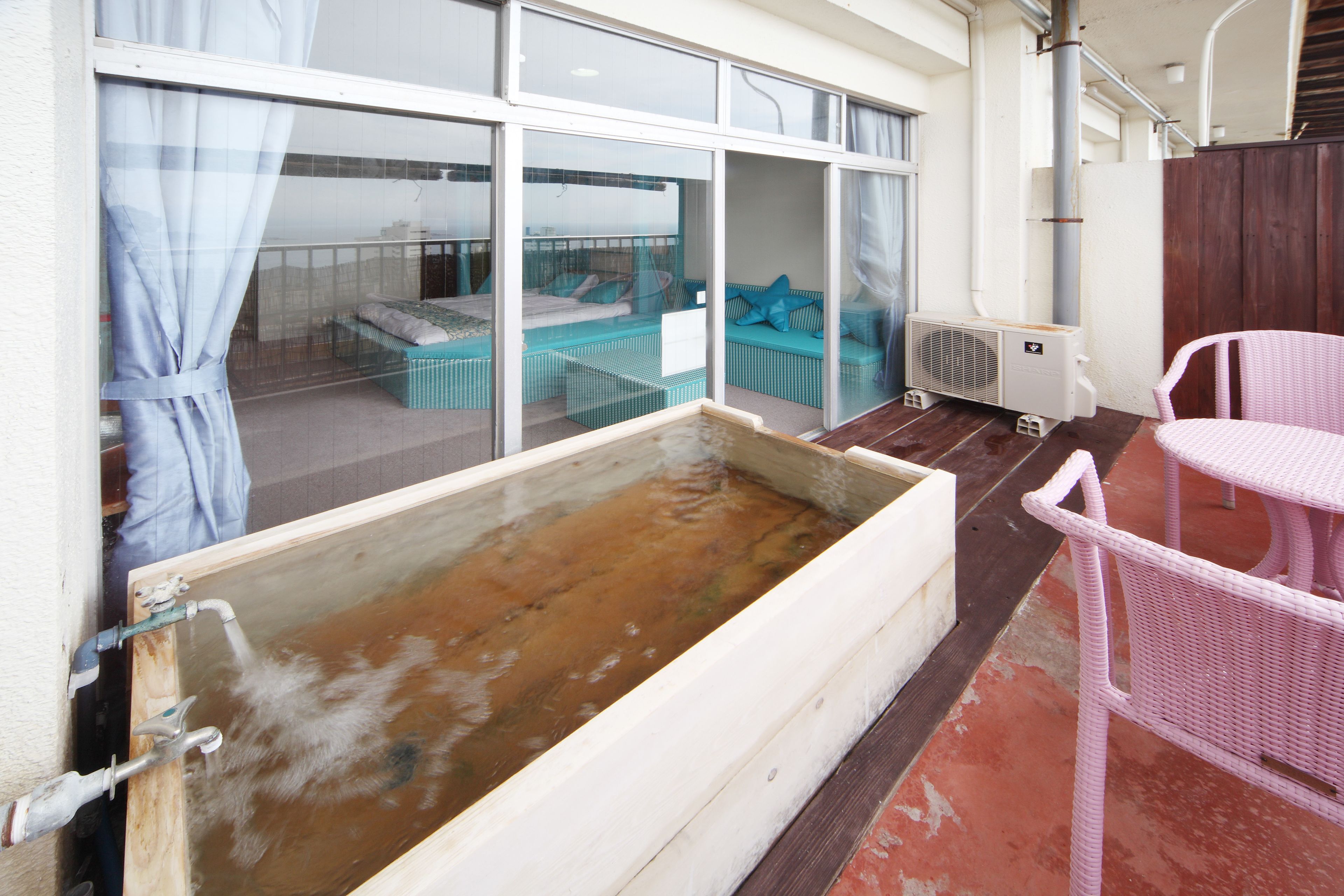 family suite, hot tub, ocean view | bed sheets