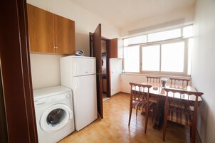 Apartment, 1 Bedroom | Living area | Flat-screen TV