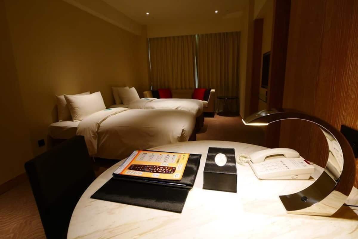 deluxe family suite | desk, laptop workspace, blackout curtains, soundproofing