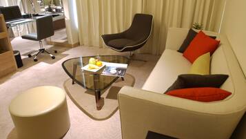 Executive Suite | Living area | TV