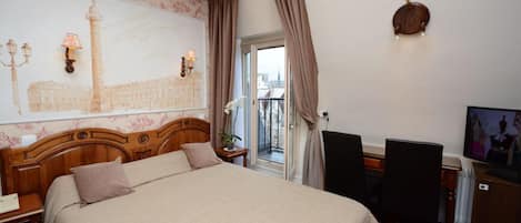 Tweepersoonskamer | Een kluis op de kamer, een bureau, gratis wifi, beddengoed