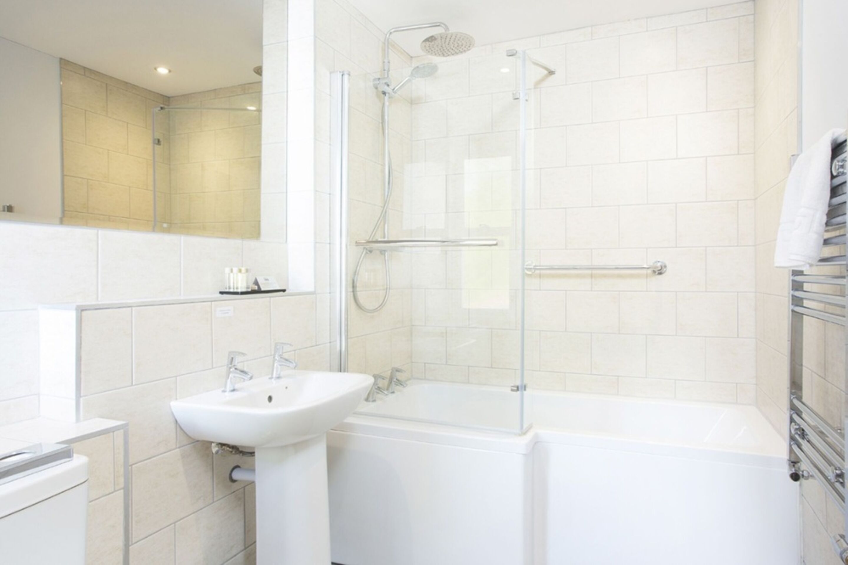 family triple room, multiple beds | bathroom | combined shower/bathtub, free toiletries, towels