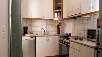 Appartement Duplex, 3 chambres | Cuisine privée | Grand réfrigérateur, micro-ondes, four, plaque de cuisson