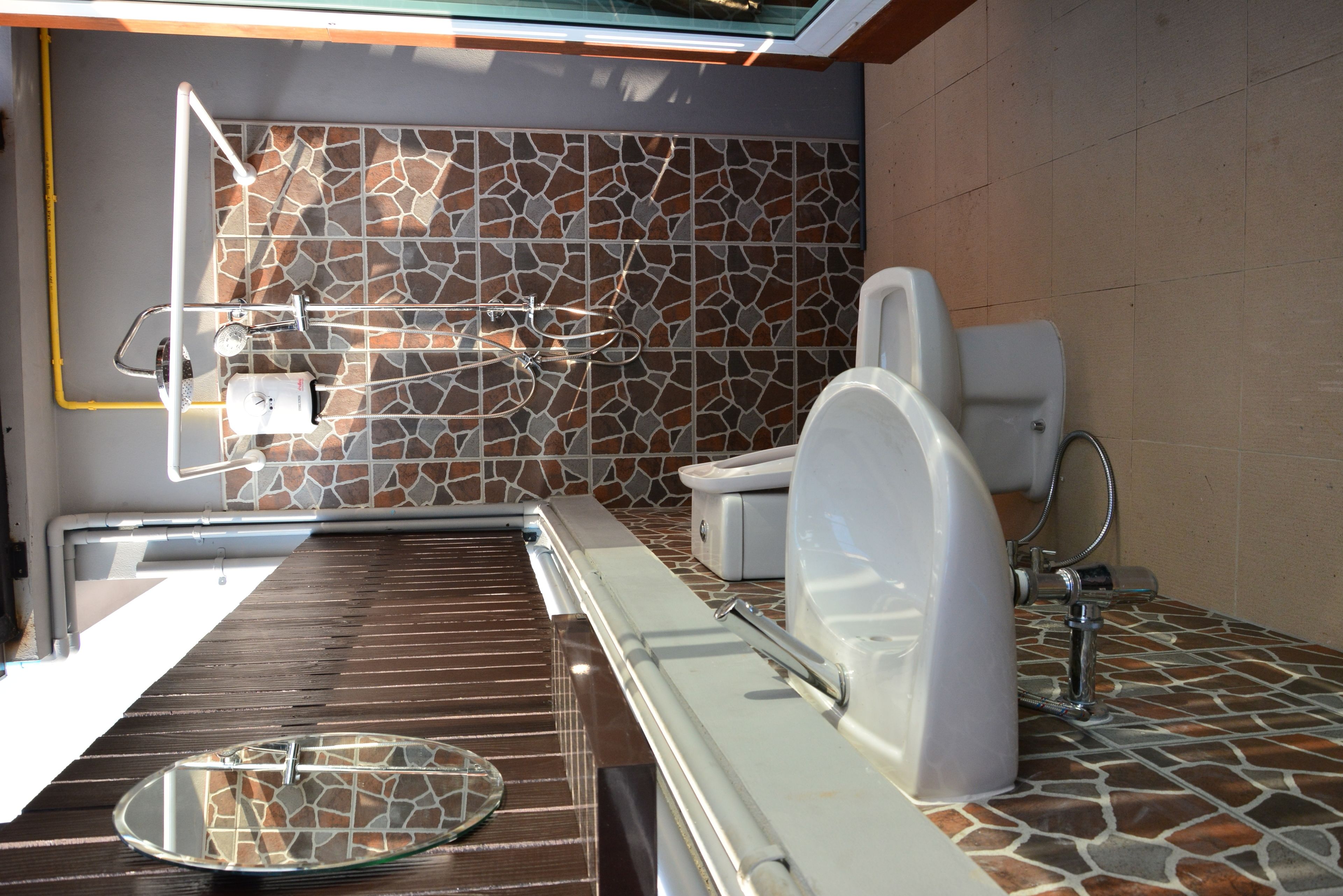 rooftop suite | bathroom | shower, free toiletries, hair dryer, towels