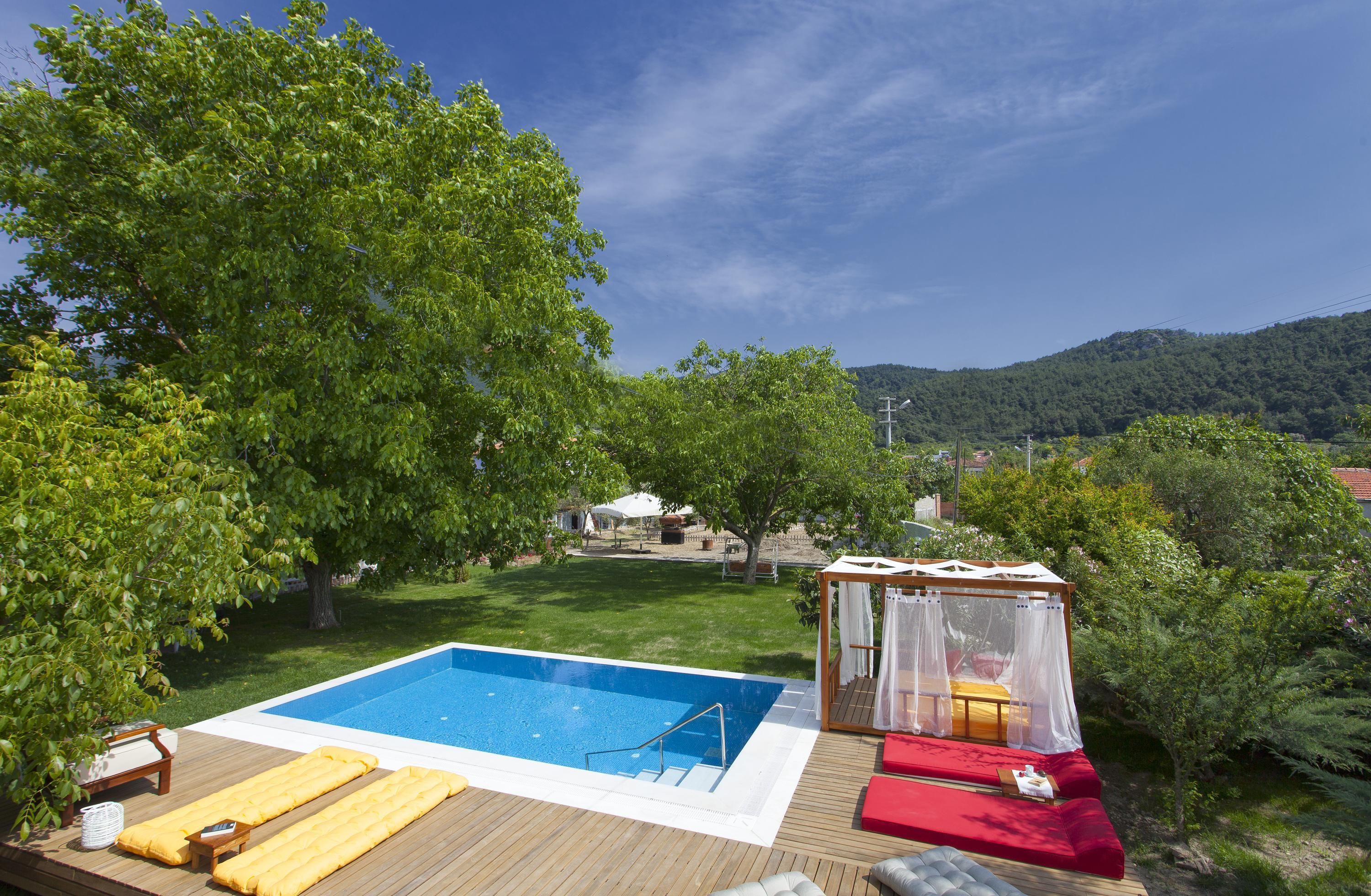 Outdoor pool, pool umbrellas, pool loungers