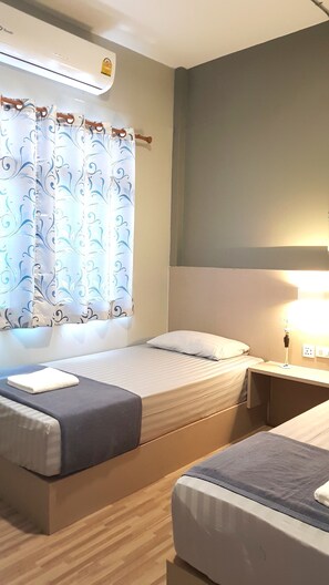 Twin Room with Shared Bathroom - AC | Wi-Fi ฟรี, ผ้าปูที่นอน