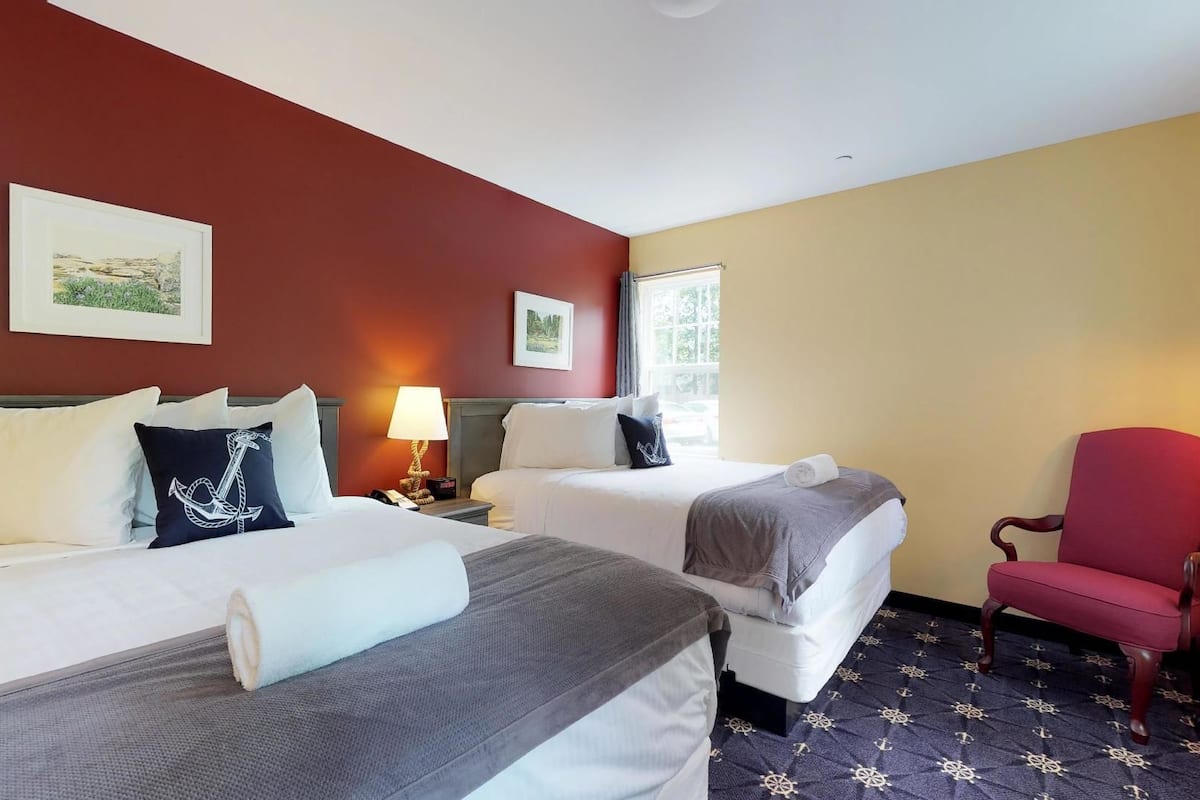 classic room, 2 queen beds | individually decorated, desk, blackout curtains, iron/ironing board