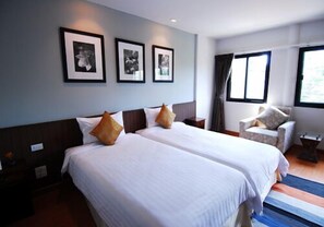 Chambre Deluxe | Coin séjour