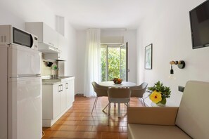 Grand Double Room, 1 Bedroom, Terrace, Ground Floor | Living area