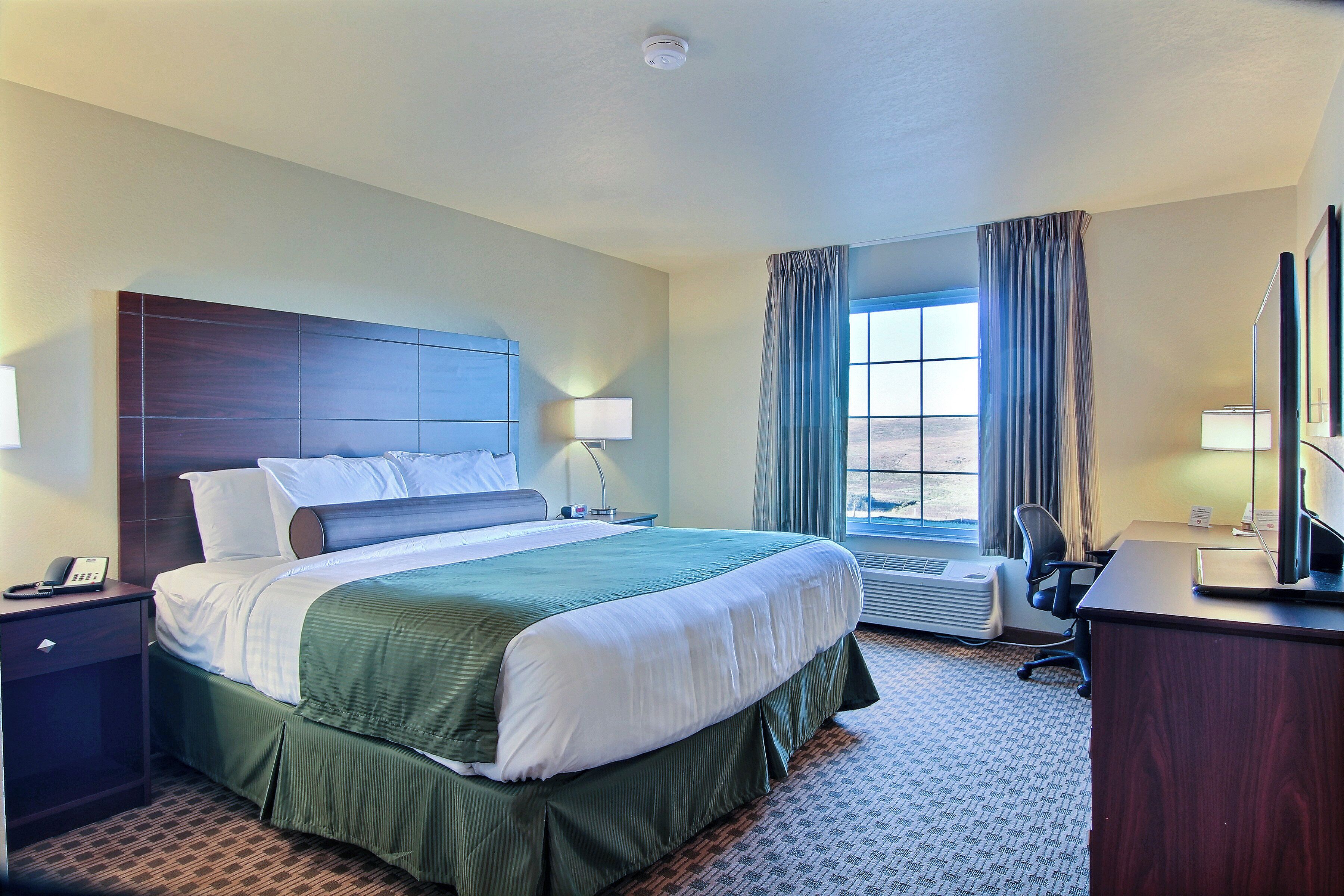 premium bedding, pillow-top beds, in-room safe, individually decorated