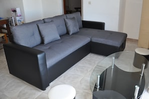 Superior appartement, 2 slaapkamers, uitzicht op zee, langs het strand | Woonkamer
