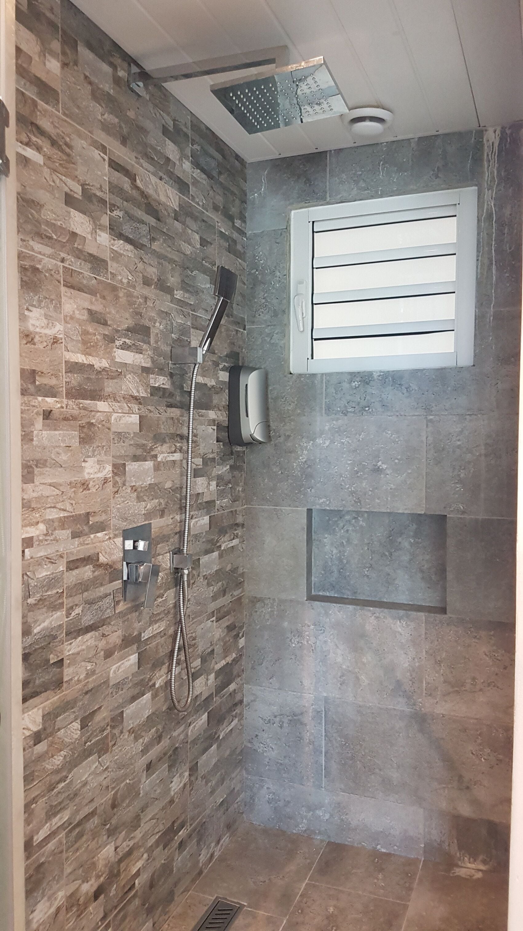 seaview room | bathroom | shower, hair dryer, towels