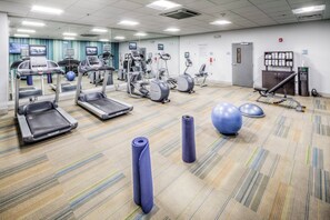 A fitness center with treadmills, elliptical machines, and exercise balls. - Holiday Inn Express & Suites Cleveland West - Westlake by IHG (Westlake)