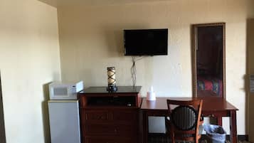Standard Room, 2 Queen Beds | Living area | 40-inch TV with cable channels