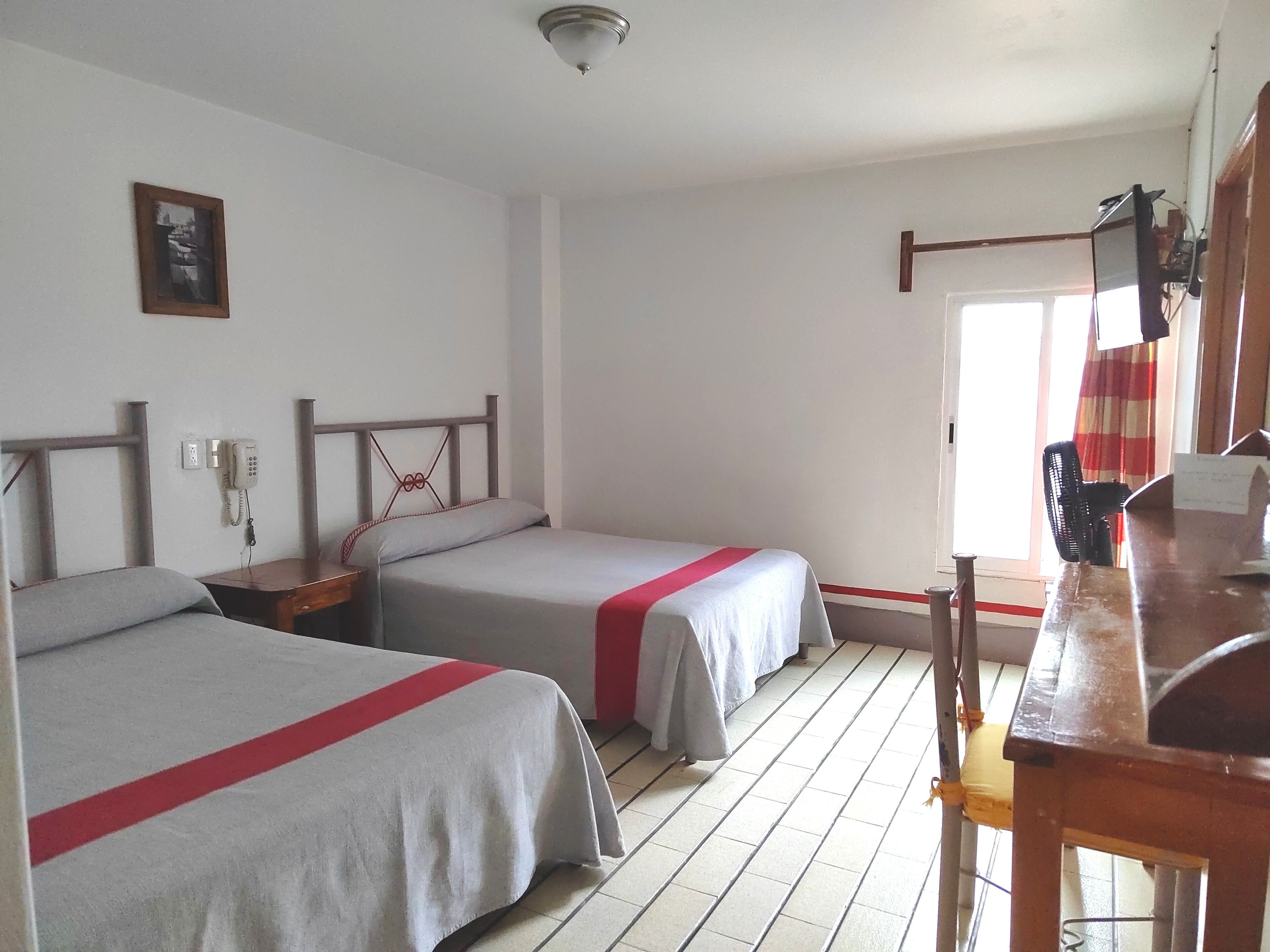 Laptop workspace, iron/ironing board, free WiFi, bed sheets