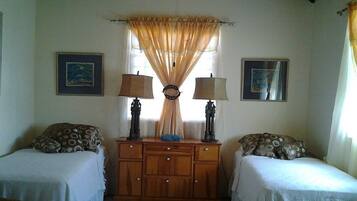Family Apartment, 3 Bedrooms, Accessible, Pool View (Hibiscus) | Premium bedding, in-room safe, iron/ironing board, cots/infant beds