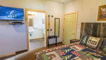 Family Room, 1 King Bed (King Room with Roll-In Shower - Disab) | Premium bedding, desk, iron/ironing board, free rollaway beds