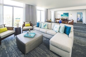 Hospitality Suite (Includes Early Park Admission*) | Living area | 49-inch flat-screen TV with cable channels, TV, pay movies - Universal's Loews Sapphire Falls Resort (Orlando)