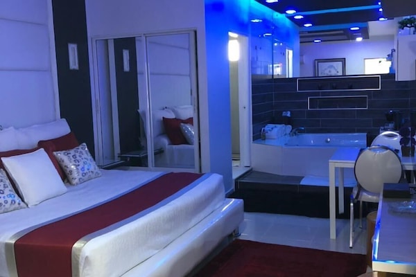 Suite, Jetted Tub | Premium bedding, in-room safe, desk, laptop workspace