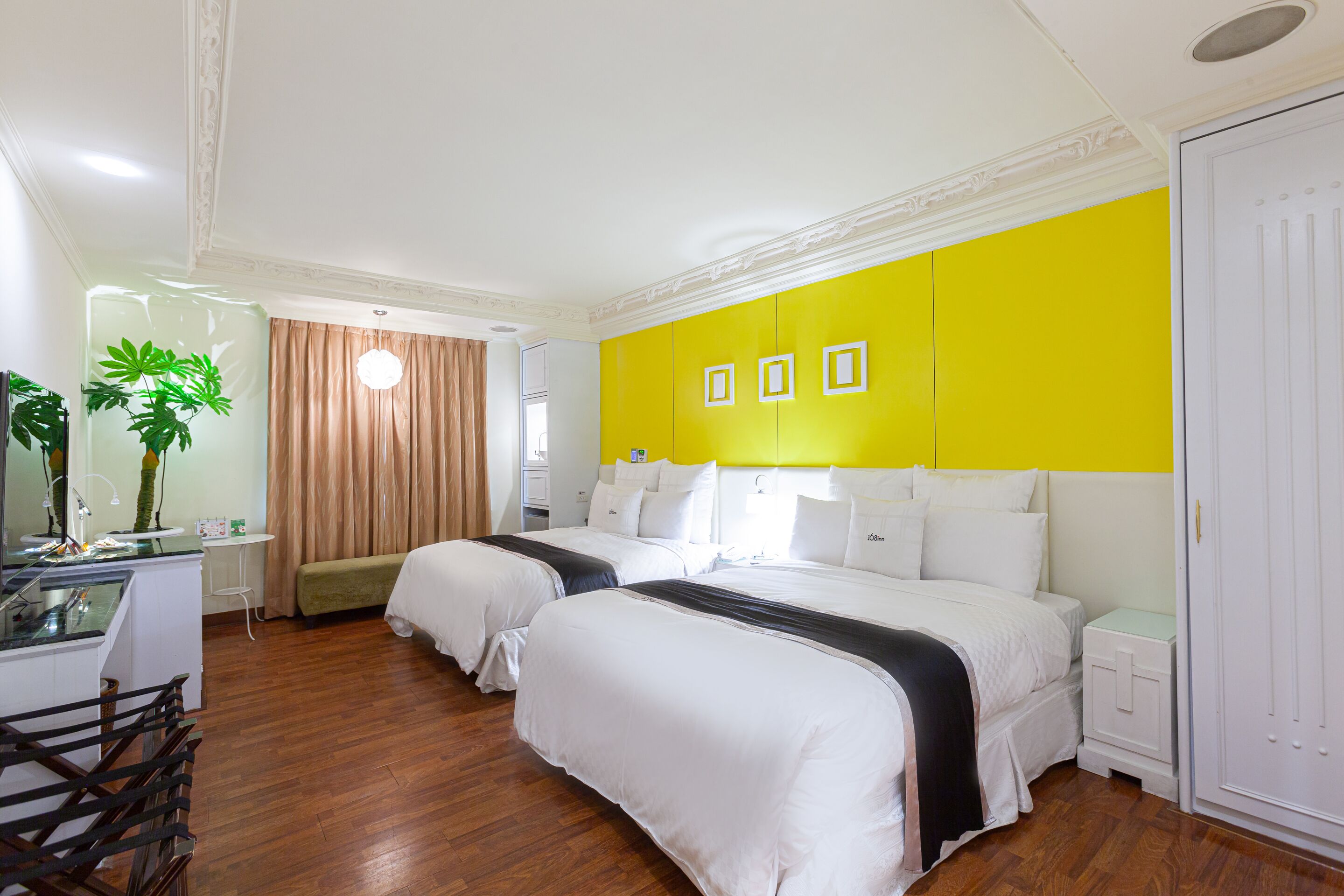 business quadruple room | free minibar, individually decorated, desk, blackout curtains