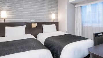 Premium bedding, down duvets, desk, laptop workspace