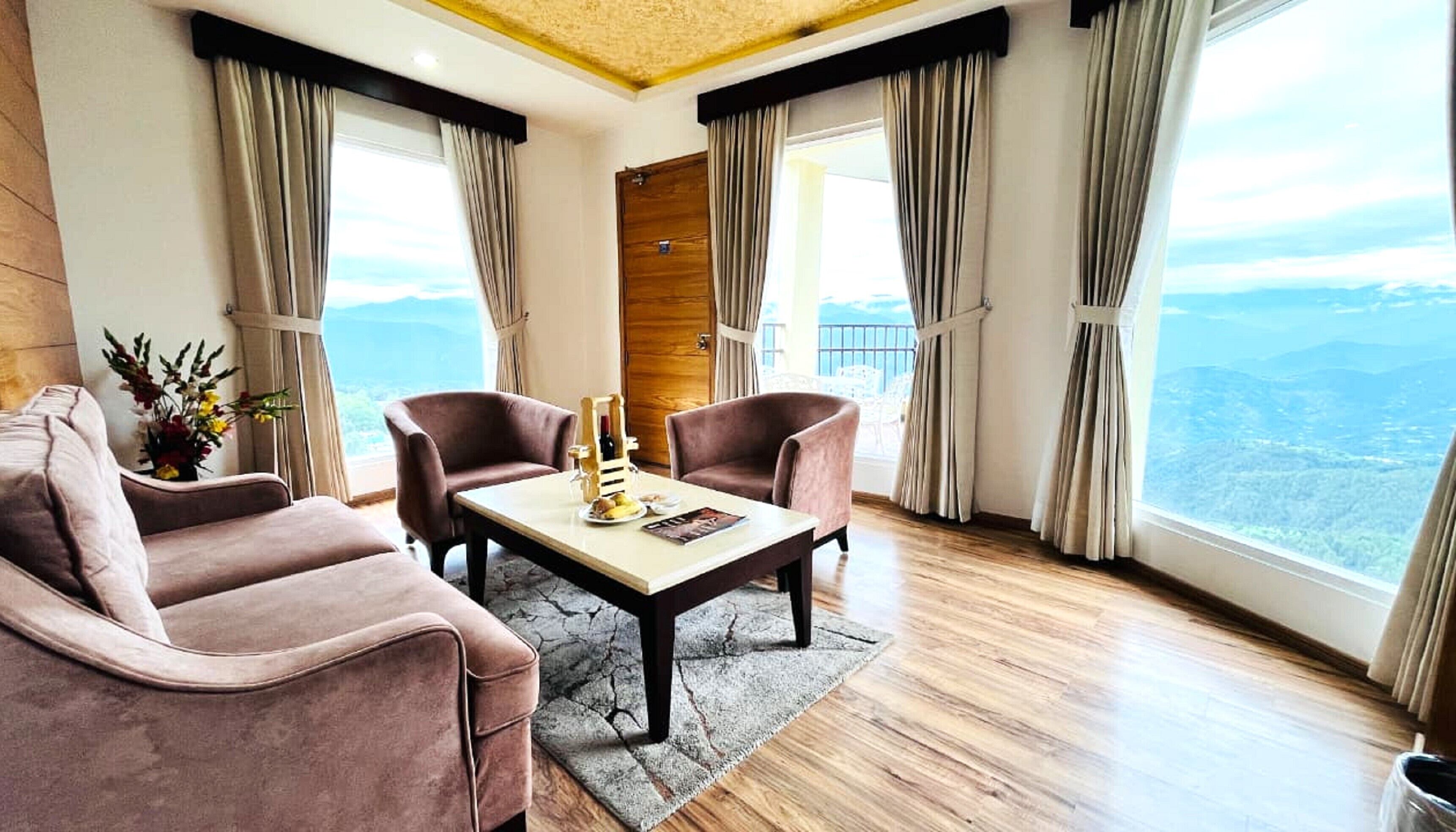 Suite Room Mountain View with Balcony | Living area | 42-inch Smart TV with cable channels, foosball, table tennis