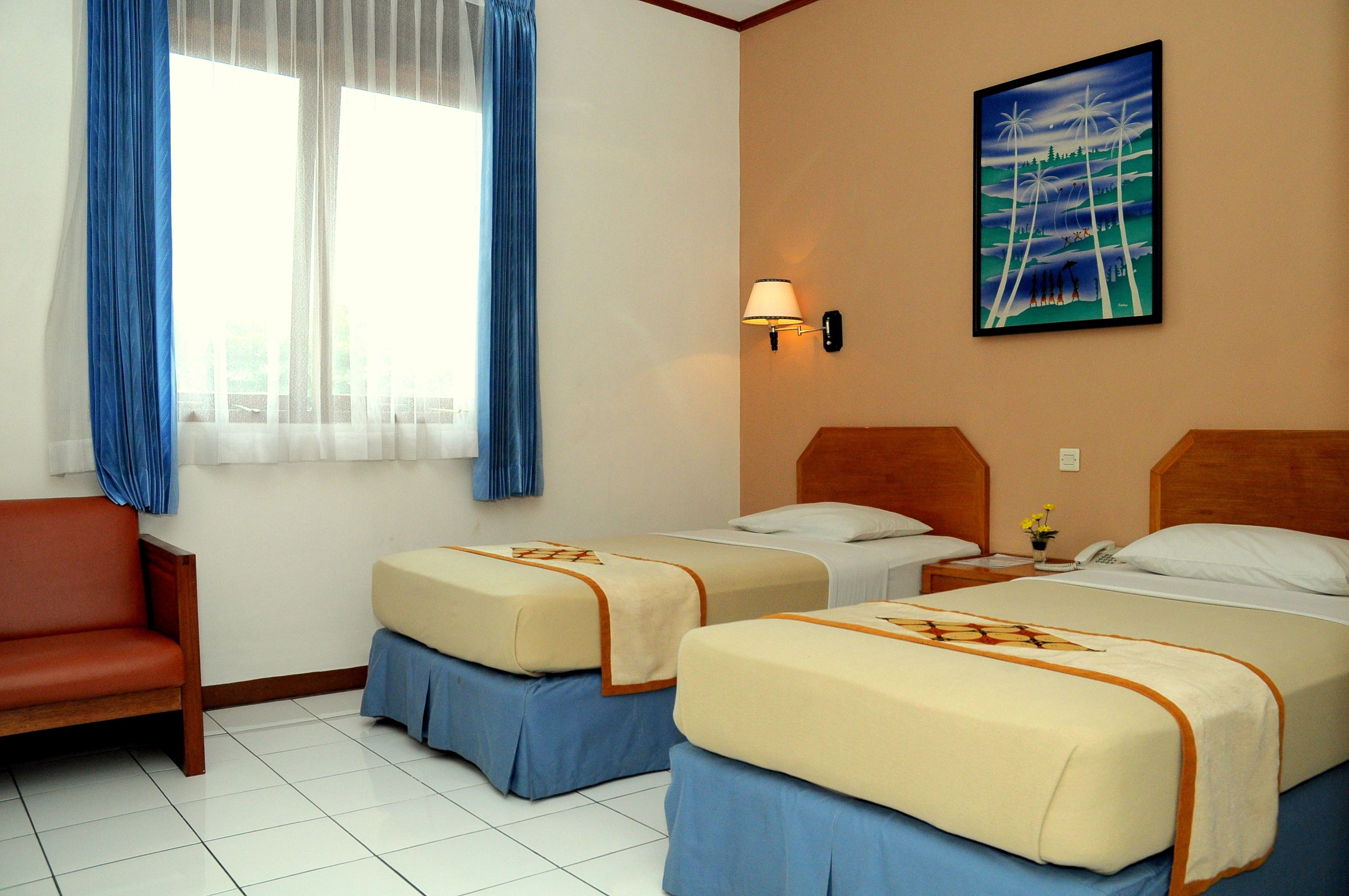 ห้องดีลักซ์ดับเบิลหรือทวิน, 1 ห้องนอน | มินิบาร์ฟรี, ตู้นิรภัยในห้องพัก, โต๊ะทำงาน, ผ้าม่านกันแสง