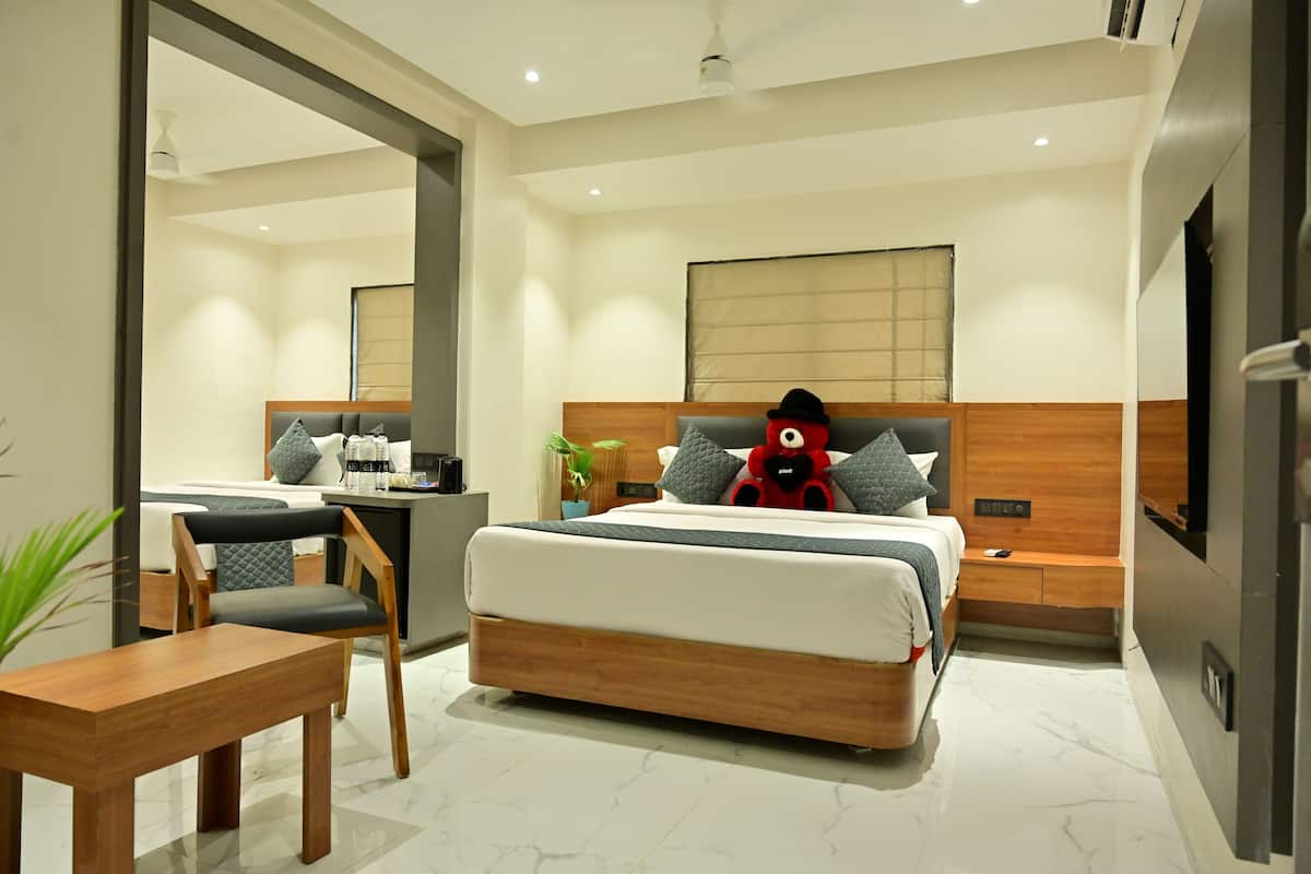 Executive Family Friendly Room | 1 bedroom, minibar, desk, iron/ironing board