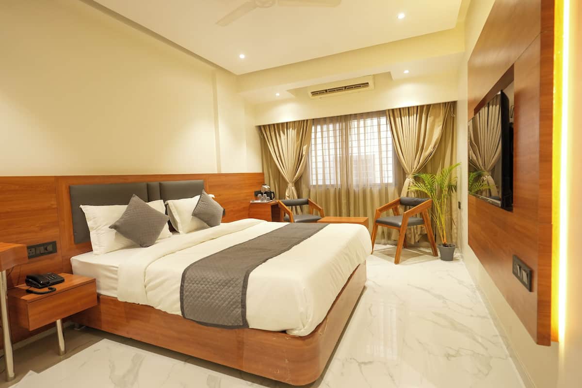 Quarto casal luxo, vista para a cidade (A/C) | 1 quarto, frigobar, escrivaninha, ferros/tábuas de passar roupa