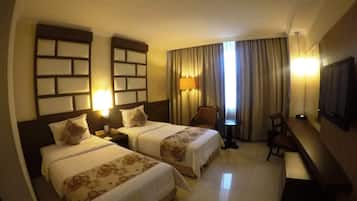 Deluxe Room | Free minibar items, in-room safe, individually decorated, desk