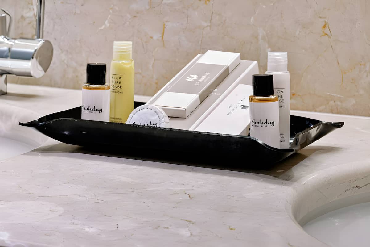 separate bathtub and shower, free toiletries, bathrobes, slippers