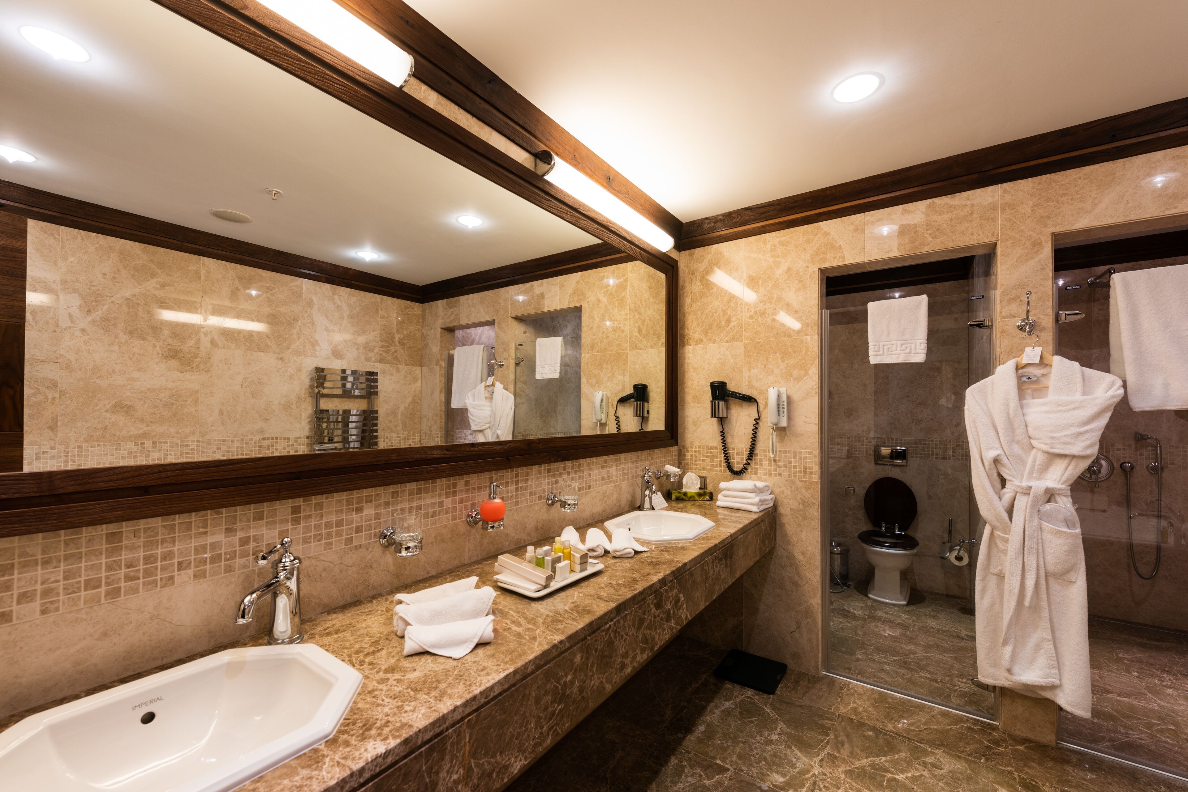 separate bathtub and shower, free toiletries, bathrobes, slippers