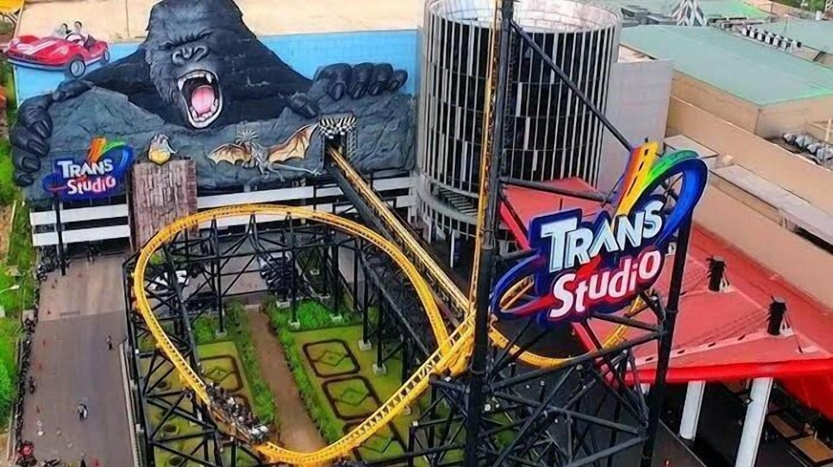 An aerial view of a roller coaster at Trans Studio theme park.