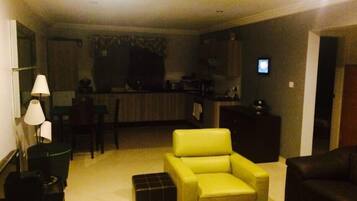 Apartment, 2 Bedrooms, Pool Access | Living area | Flat-screen TV