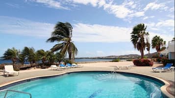 Outdoor pool, pool umbrellas, sun loungers