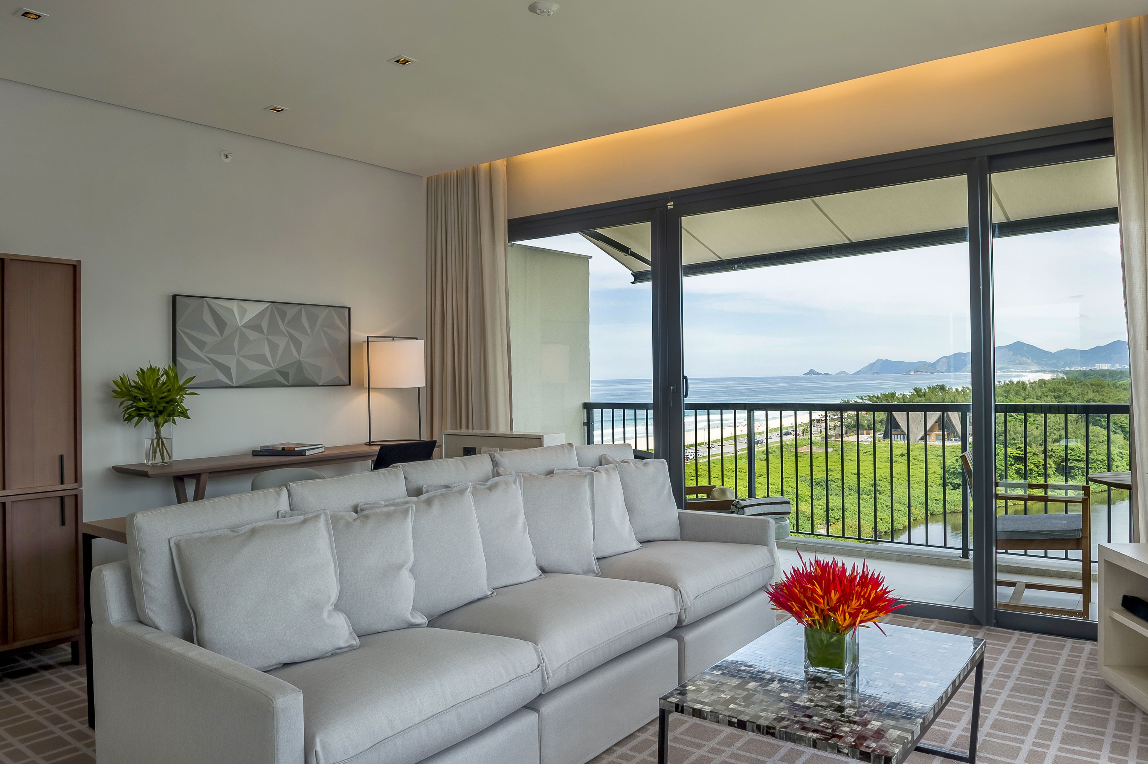 Suite (Ocean Lagoon) | Living room | 42-inch TV with cable channels, toys, streaming services