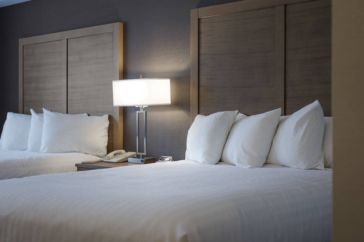 standard room, 2 queen beds, non smoking | desk, blackout curtains, iron/ironing board, free cots/infant beds